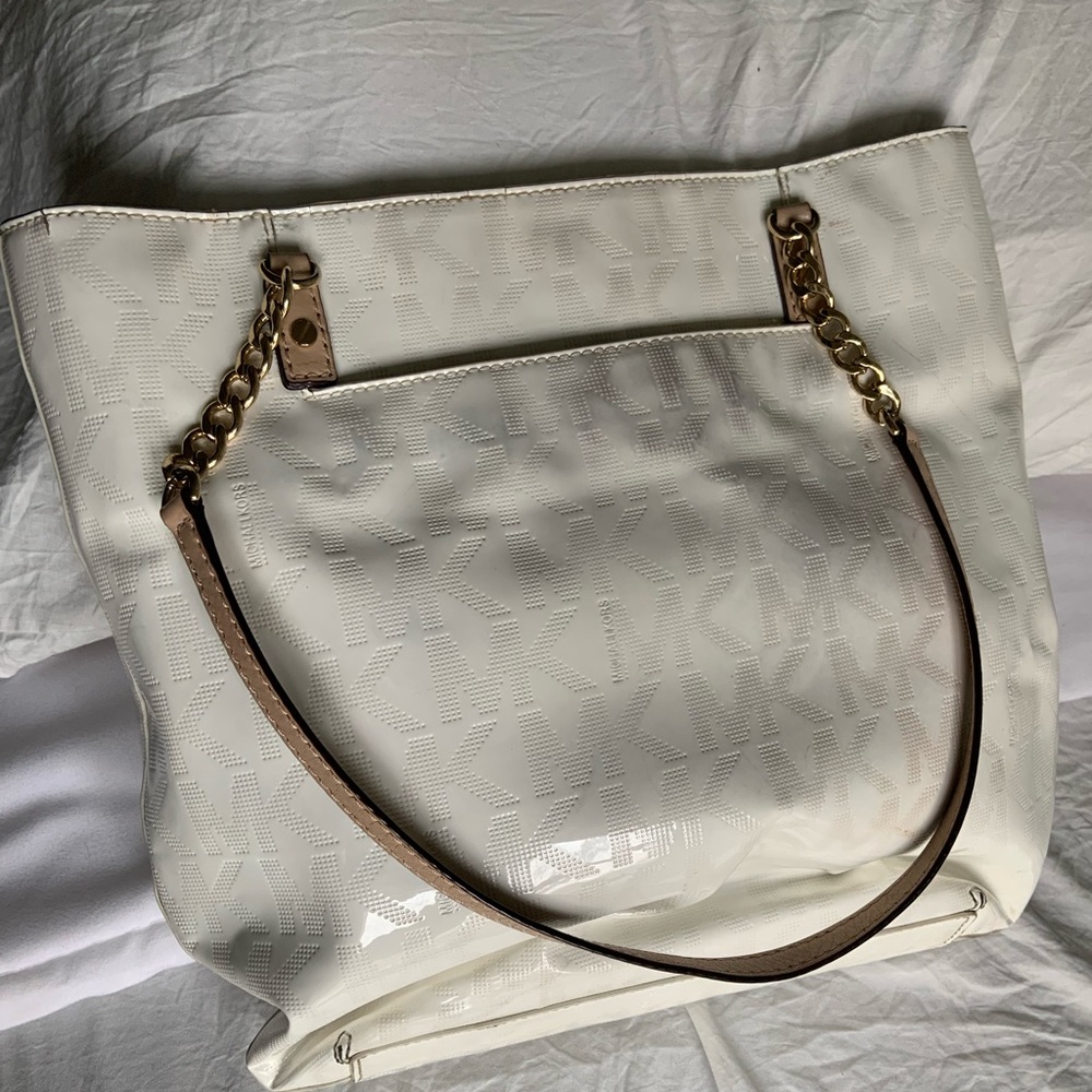 Micheal Kors white & gold patent leather tote. Used condition.